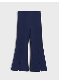 Sinsay - Spodnie flare z ozdobnymi rozcięciami - granatowy ze sklepu Sinsay w kategorii Spodnie dziewczęce - zdjęcie 188634050