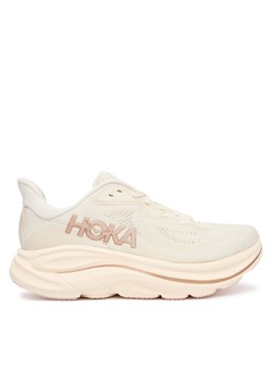 Hoka Buty do biegania Clifton 10 1162031 Écru ze sklepu MODIVO w kategorii Buty sportowe damskie - zdjęcie 188644301
