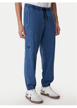 Reebok Spodnie dresowe Ambrose RK25543CCM Niebieski Regular Fit ze sklepu MODIVO w kategorii Spodnie męskie - zdjęcie 188677223