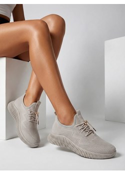 Aurelia Bianca – białe damskie sneakersy Royalfashion na płaskiej podeszwie ze sklepu royalfashion.pl w kategorii Buty sportowe damskie - zdjęcie 188687074