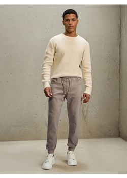 Sinsay - Jeansy jogger - kremowy ze sklepu Sinsay w kategorii Jeansy męskie - zdjęcie 188696520