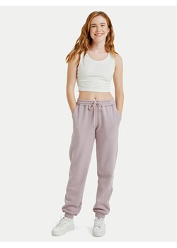 Roxy Spodnie dresowe Surf Stoked Pant Brushed ERJFB03491 Fioletowy Regular Fit ze sklepu MODIVO w kategorii Spodnie damskie - zdjęcie 188717522