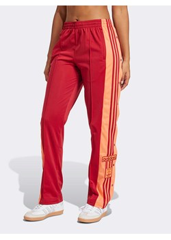 adidas Spodnie dresowe w kolorze czerwono-pomarańczowym ze sklepu Limango Polska w kategorii Spodnie damskie - zdjęcie 188726161