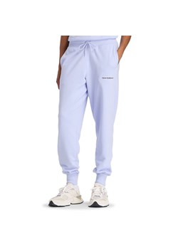 Spodnie damskie New Balance WB61D3EADYK - fioletowe ze sklepu streetstyle24.pl w kategorii Spodnie damskie - zdjęcie 188726600