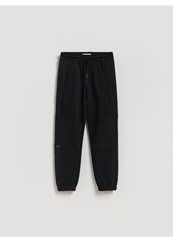 Reserved - Bawełniane spodnie jogger - czarny ze sklepu Reserved w kategorii Spodnie chłopięce - zdjęcie 188733521