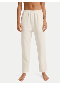Roxy Spodnie dresowe Rise & Vibe Sweets ERJNP03660 Écru Regular Fit ze sklepu MODIVO w kategorii Spodnie damskie - zdjęcie 188744932