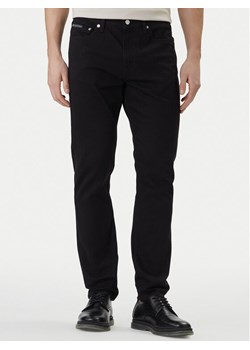 Calvin Klein Jeans Jeansy LV04RF740G Czarny Slim Taper Fit ze sklepu MODIVO w kategorii Jeansy męskie - zdjęcie 188751054