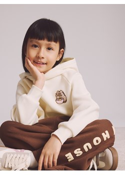 Reserved - Spodnie dresowe Pusheen - ciemnobrązowy ze sklepu Reserved w kategorii Spodnie dziewczęce - zdjęcie 188751653