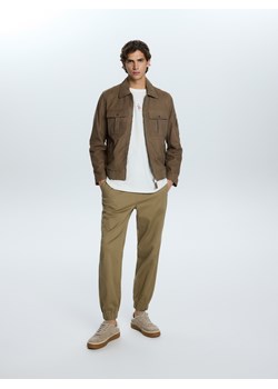 Reserved - Spodnie jogger slim fit - beżowy ze sklepu Reserved w kategorii Spodnie męskie - zdjęcie 188753533