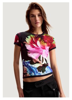 Desigual T-Shirt TS_MULTIFLOWERS_LAC Niebieski Casual Fit ze sklepu MODIVO w kategorii Bluzki damskie - zdjęcie 188806582