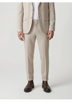 Reserved - Garniturowe spodnie w kant - beżowy ze sklepu Reserved w kategorii Spodnie męskie - zdjęcie 188821462