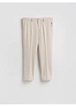 Reserved - Garniturowe spodnie w kant - beżowy ze sklepu Reserved w kategorii Spodnie męskie - zdjęcie 188822932
