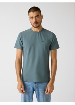 Guess T-Shirt 180290 Zielony Classic Fit ze sklepu MODIVO w kategorii T-shirty męskie - zdjęcie 188828164