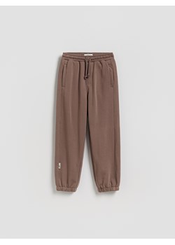 Reserved - Bawełniane spodnie jogger - brązowy ze sklepu Reserved w kategorii Spodnie chłopięce - zdjęcie 188841120