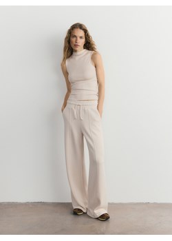 Reserved - Luźne spodnie - kremowy ze sklepu Reserved w kategorii Spodnie damskie - zdjęcie 188854424