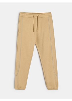 Sinsay - Spodnie dresowe - beżowy ze sklepu Sinsay w kategorii Spodnie męskie - zdjęcie 188854822