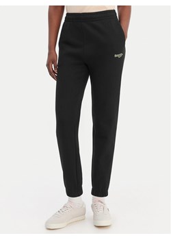 Lacoste Spodnie dresowe XF7604 Czarny Regular Fit ze sklepu MODIVO w kategorii Spodnie damskie - zdjęcie 188868933