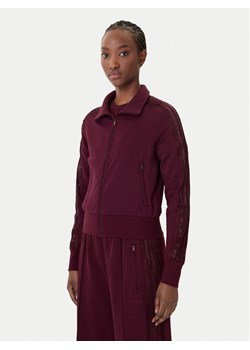 adidas Bluza Firebird Lace KC6451 Bordowy Slim Fit ze sklepu MODIVO w kategorii Bluzy damskie - zdjęcie 188888944
