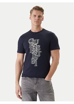 Guess T-Shirt M6GI10 K2991 Granatowy Slim Fit ze sklepu MODIVO w kategorii T-shirty męskie - zdjęcie 188903784