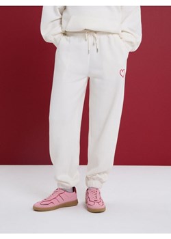 Sinsay - Polarowe spodnie jogger - kremowy ze sklepu Sinsay w kategorii Spodnie damskie - zdjęcie 188920454