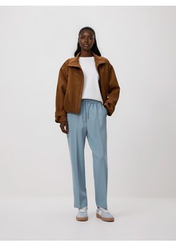 Reserved - Spodnie z kantem - jasnoniebieski ze sklepu Reserved w kategorii Spodnie damskie - zdjęcie 188939504