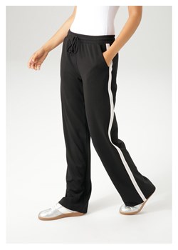 Aniston Spodnie dresowe w kolorze czarnym ze sklepu Limango Polska w kategorii Spodnie damskie - zdjęcie 188947964