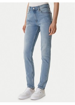Tommy Hilfiger Jeansy WW0WW47694 Niebieski Slim Fit ze sklepu MODIVO w kategorii Jeansy damskie - zdjęcie 188960370