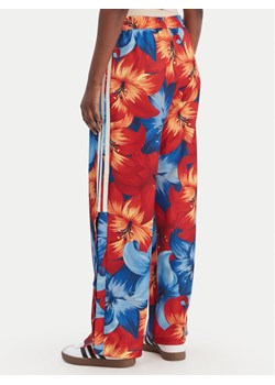 adidas Spodnie dresowe Farm Rio House Of Tiro KD4633 Niebieski Loose Fit ze sklepu MODIVO w kategorii Spodnie damskie - zdjęcie 188962631