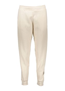 Puma Spodnie dresowe "Essentials+" w kolorze beżowym ze sklepu Limango Polska w kategorii Spodnie damskie - zdjęcie 188972544