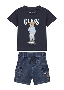Guess Komplet t-shirt i szorty jeansowe I6GG04 K8HM4 Kolorowy Regular Fit ze sklepu MODIVO w kategorii Komplety niemowlęce - zdjęcie 188979771