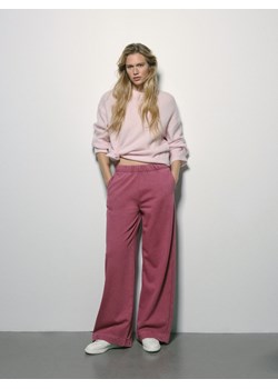 Reserved - Spodnie dresowe z bawełną - jasnofioletowy ze sklepu Reserved w kategorii Spodnie damskie - zdjęcie 188997404