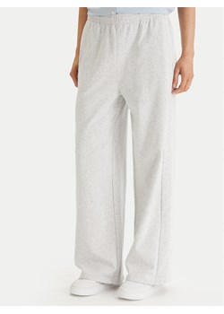 Tommy Hilfiger Spodnie dresowe UW0UW06180 Szary Wide Leg ze sklepu MODIVO w kategorii Spodnie damskie - zdjęcie 189004193