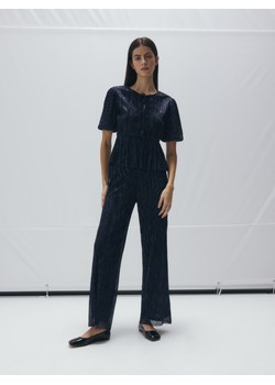 Reserved - Błyszczące spodnie - granatowy ze sklepu Reserved w kategorii Spodnie damskie - zdjęcie 189011351
