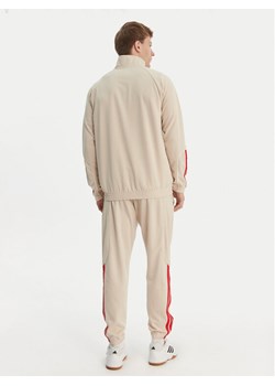 adidas Dres Stadium 3-Stripes KB6198 Beżowy Slim Fit ze sklepu MODIVO w kategorii Dresy męskie - zdjęcie 189079314
