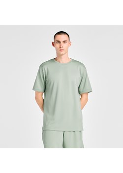 Koszulka męska New Balance MT6100FRAAR – zielona ze sklepu New Balance Poland w kategorii T-shirty męskie - zdjęcie 189080342