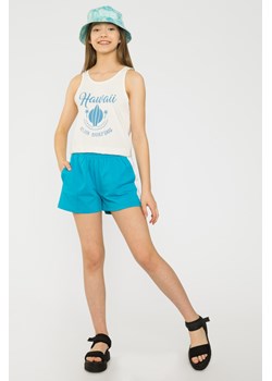 Kremowy top na ramiączkach HAWAII, Rozmiar - 146, Kolor - Kremowy ze sklepu REPORTER w kategorii Bluzki dziewczęce - zdjęcie 189105381