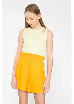 Żółty pastelowy top z rozcięciem, Rozmiar - 146, Kolor - Żółty ze sklepu REPORTER w kategorii Bluzki dziewczęce - zdjęcie 189105391