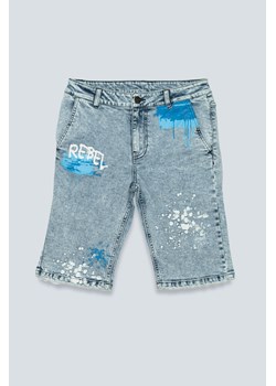 Krótkie jeansowe spodenki z efektem plam farby, Rozmiar - 164, Kolor - Niebieski ze sklepu REPORTER w kategorii Spodenki chłopięce - zdjęcie 189105603