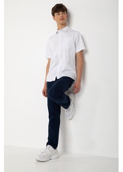 Granatowe spodnie REGULAR, Rozmiar - 146, Kolor - Granatowy ze sklepu REPORTER w kategorii Spodnie chłopięce - zdjęcie 189106144