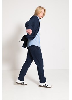 Spodnie garniturowe w drobną grantowo-czarną kratkę, Rozmiar - 140, Kolor - Granatowy ze sklepu REPORTER w kategorii Spodnie chłopięce - zdjęcie 189106462