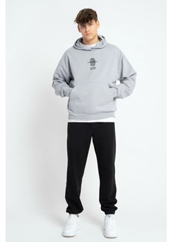 Czarne spodnie dresowe REGULAR bez nadruków, Rozmiar - 146, Kolor - Czarny ze sklepu REPORTER w kategorii Spodnie chłopięce - zdjęcie 189107992