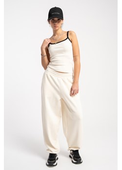 Kremowe spodnie dresowe gładkie o kroju BALLOON, Rozmiar - 140, Kolor - Kremowy ze sklepu REPORTER w kategorii Spodnie dziewczęce - zdjęcie 189108244