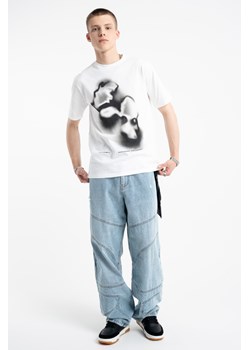 Niebieskie spodnie jensowe o kroju BAGGY z modnymi cięciami, Kolor - Niebieski, Rozmiar - 182 ze sklepu REPORTER w kategorii Spodnie chłopięce - zdjęcie 189108833