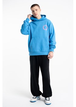 Czarne spodnie dresowe OVERSIZE z przestrzennym haftem, Rozmiar - 176, Kolor - Czarny ze sklepu REPORTER w kategorii Spodnie chłopięce - zdjęcie 189109894