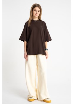 Kremowe spodnie dresowe WIDE LEG bez nadruków, Rozmiar - 140, Kolor - Beżowy ze sklepu REPORTER w kategorii Spodnie dziewczęce - zdjęcie 189110762