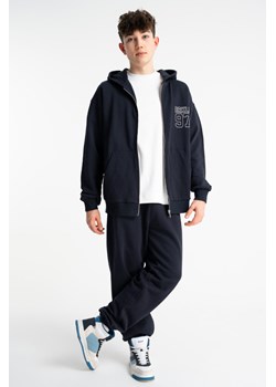Granatowe spodnie dresowe OVERSIZE bez nadruków, Rozmiar - 146, Kolor - Granatowy ze sklepu REPORTER w kategorii Spodnie chłopięce - zdjęcie 189111073