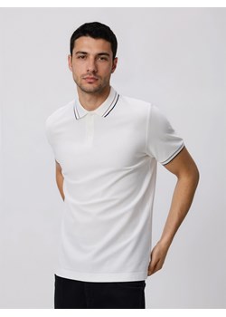 Reserved - Koszulka polo z bawełny merceryzowanej - złamana biel ze sklepu Reserved w kategorii T-shirty męskie - zdjęcie 189122943