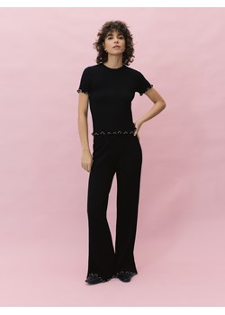 Reserved - Dzianinowe spodnie z ozdobnym wykończeniem - czarny ze sklepu Reserved w kategorii Spodnie damskie - zdjęcie 189125011