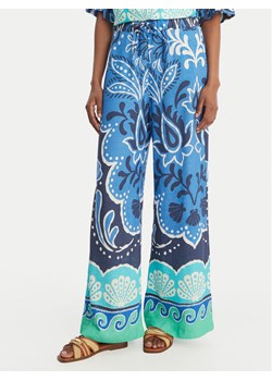 Banana Moon Spodnie materiałowe Alcaniz Cleariv MYY56 Błękitny Regular Fit ze sklepu MODIVO w kategorii Spodnie damskie - zdjęcie 189127020