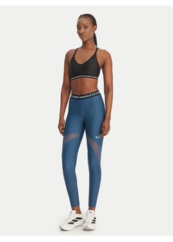 Under Armour Legginsy HeatGear® 6010009 Granatowy Slim Fit ze sklepu MODIVO w kategorii Spodnie damskie - zdjęcie 189135660